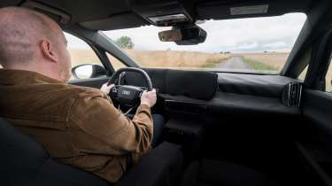 Ellis Hyde driving the Audi A2 e-tron prototype