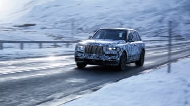 Rolls Royce Cullinan front side snow