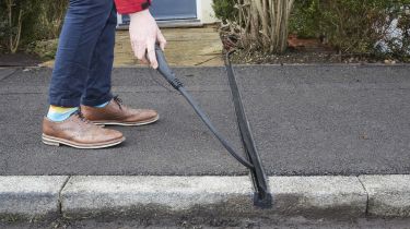 Cross-pavement EV charging solution