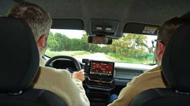 Auto Express deputy editor Richard Ingram driving the Dacia Duster