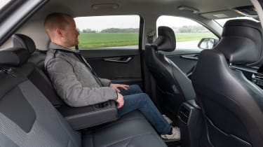 Auto Express chief reviewer Alex Ingram in Kia Niro EV rear seats