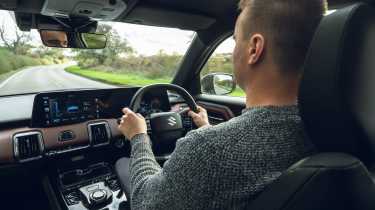 Alastair Crooks driving the Suzuki e Vitara Motion