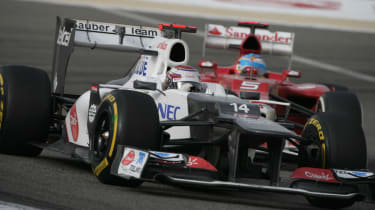 Kamui Kobayashi ahead of Fernando Alonso