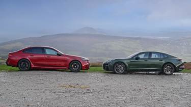 BMW M5 and Porsche Panamera Turbo E-Hybrid - side view static