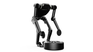 Renault Calvin - front bending over to pick up tyre