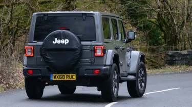 Jeep Wrangler driving rear