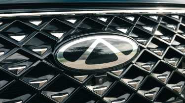 Chery Tiggo 8 - grille badge
