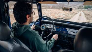 Auto Express senior staff writer Jordan Katsianis driving the Toyota Land Cruiser FJ40