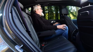 Porsche Cayenne vs BMW X5 - BMW X5 rear seats with Auto Express senior test editor, Dean Gibson 