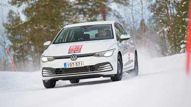 VW Golf in snow - front