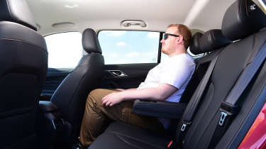 New MG HS - rear seats with Auto Express news reporter Ellis Hyde 