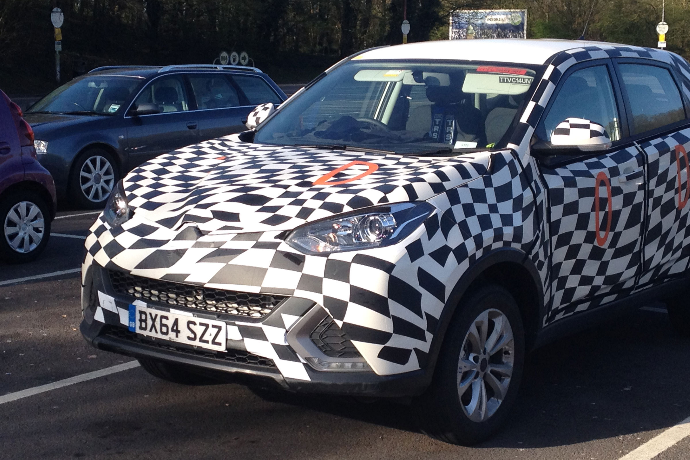 MG's first SUV spotted testing with minimal disguise 