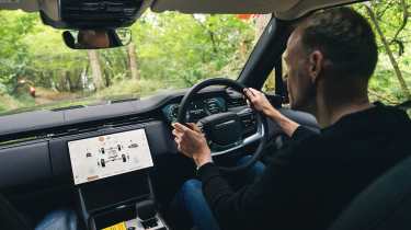 Phil McNamara driving the Range Rover Electric