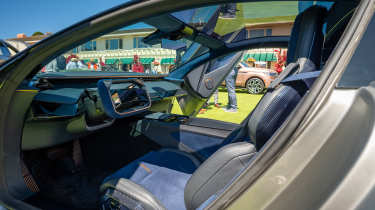 Karma GT-UV at Monterey Car Week - front interior 