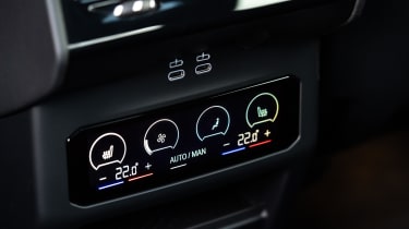 BMW i5 rear four-zone climate control screen