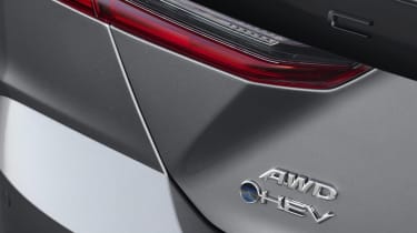 Toyota Camry 2024 official - hybrid badge