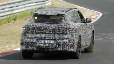 New BMW iX5 M at the Nurburgring - rear action