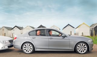 BMW 5-Series header.