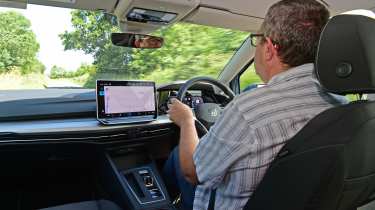 John McIlroy driving the Volkswagen Golf