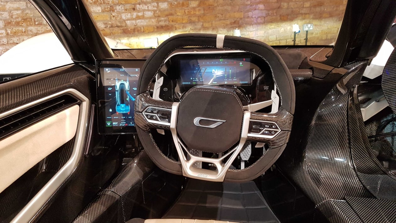 https://media.autoexpress.co.uk/image/private/s--GgnNPfjp--/f_auto,t_content-image-full-desktop@1/v1583934908/autoexpress/2020/03/Czinger%2021C%20revealed-14.jpg