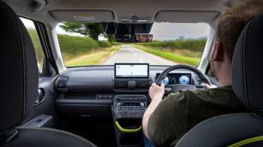 Auto Express news reporter Ellis Hyde driving the Hyundai Inster Cross