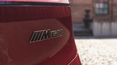 BMW iX M60 - rear badge