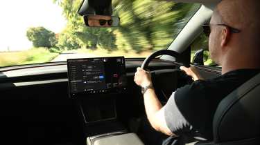 Tesla Model Y Performance 2025 - Alex Ingram driving