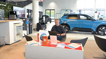 Nissan Qashqai e-Power Tekna+ - working in a dealer