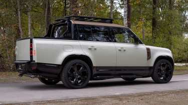 Land Rover Defender pick-up - rear angled white