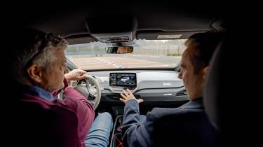 Auto Express consumer editor Chris Rosamond testing a steer-by-wire system