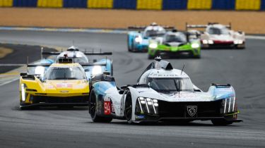 Le Mans racing cars on the Dunlop Chicane