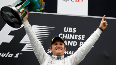 Nico Rosberg celebrates on the podium