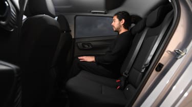 Vauxhall Corsa vs Hyundai i20 - Hyundai rear seats with Auto Express senior staff writer Jordan Katsianis 