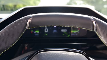 Peugeot 408 dashboard screen obscured by steering wheel