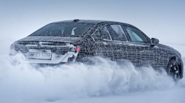 Camouflaged BMW i5 winter testing (official picture) - rear drifting