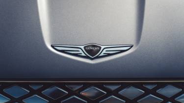 Genesis GV70 Electrified - Genesis badge