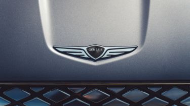Genesis GV70 Electrified - Genesis badge