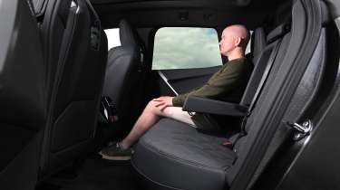 Alex Ingram sat in the BMW iX
