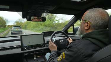 Toyota C-HR+ - interior, car being driven by Auto Express senior test editor Dean Gibson