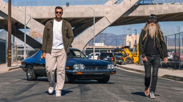 Magnus Walker and Khyzyl Saleem standing in front of a Jaguar XJS