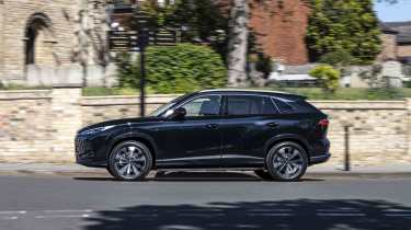 MG HS PHEV - side, urban shot