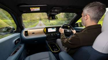 Richard Ingram driving the Fiat Grande Panda Hybrid in the UK