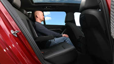 BMW i5 Touring M60 xDrive - rear interior, car being sat in by Auto Express chief reviewer Alex Ingram 