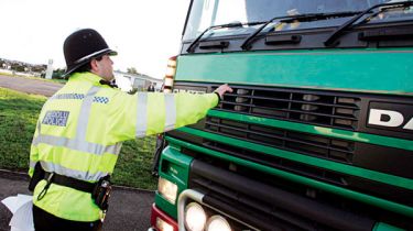Policeman and lorry