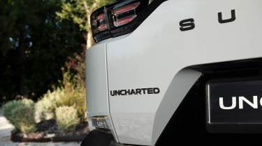 Subaru Uncharted - rear badge