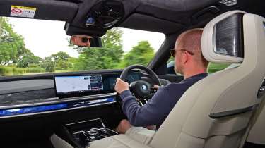 Auto Express chief reviewer Alex Ingram driving the BMW i7