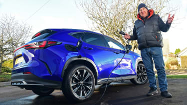 Lexus NX 450h+ - Kim Adams holding a charging cable