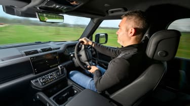 Auto Express deputy editor Richard Ingram driving the Land Rover Defender 130 P500 AWD