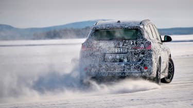 BMW iX1 winter testing - snow drifting rear