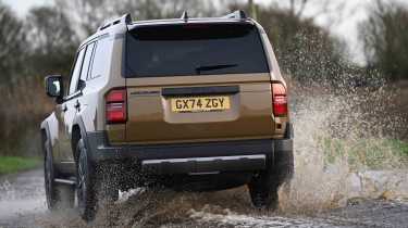 Toyota Land Cruiser - driving through water - rear